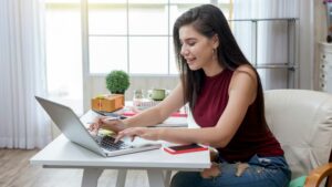 business woman on laptop at desk